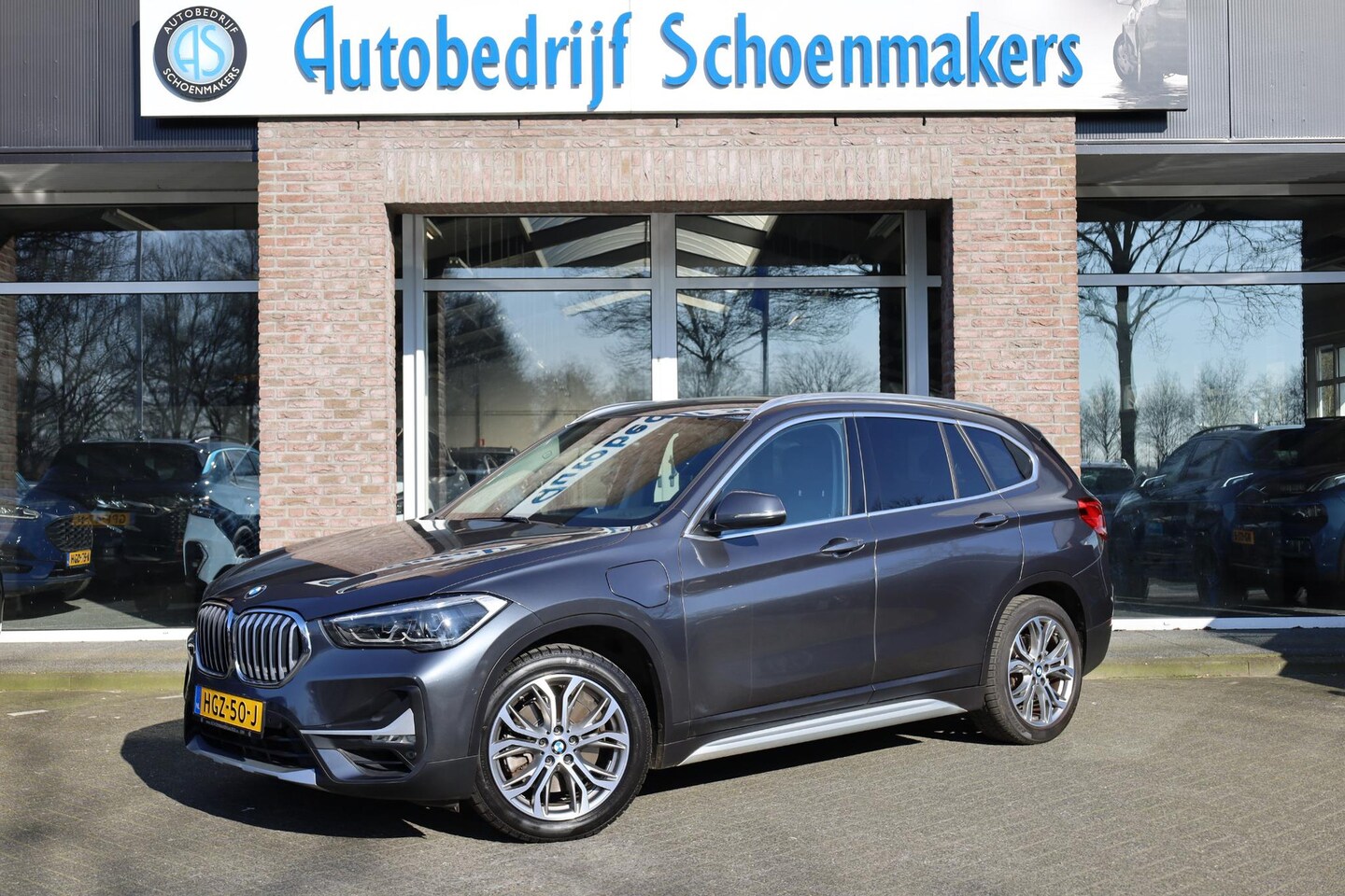 BMW X1 - xDrive25e High Executive Edition PLUG-IN! LEER TREKHAAK-AFN HUD CAMERA CRUISE DAB NAVI STO - AutoWereld.nl