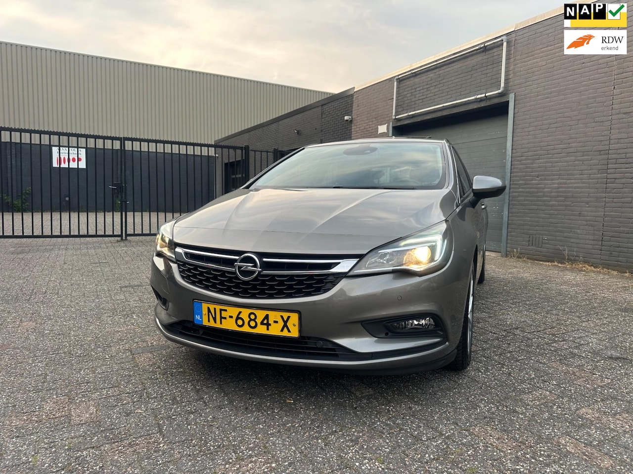 Opel Astra - 1.4 Business+ Aut. Clima Navi Dak PDC Led LM-Wielen APK NAP. - AutoWereld.nl