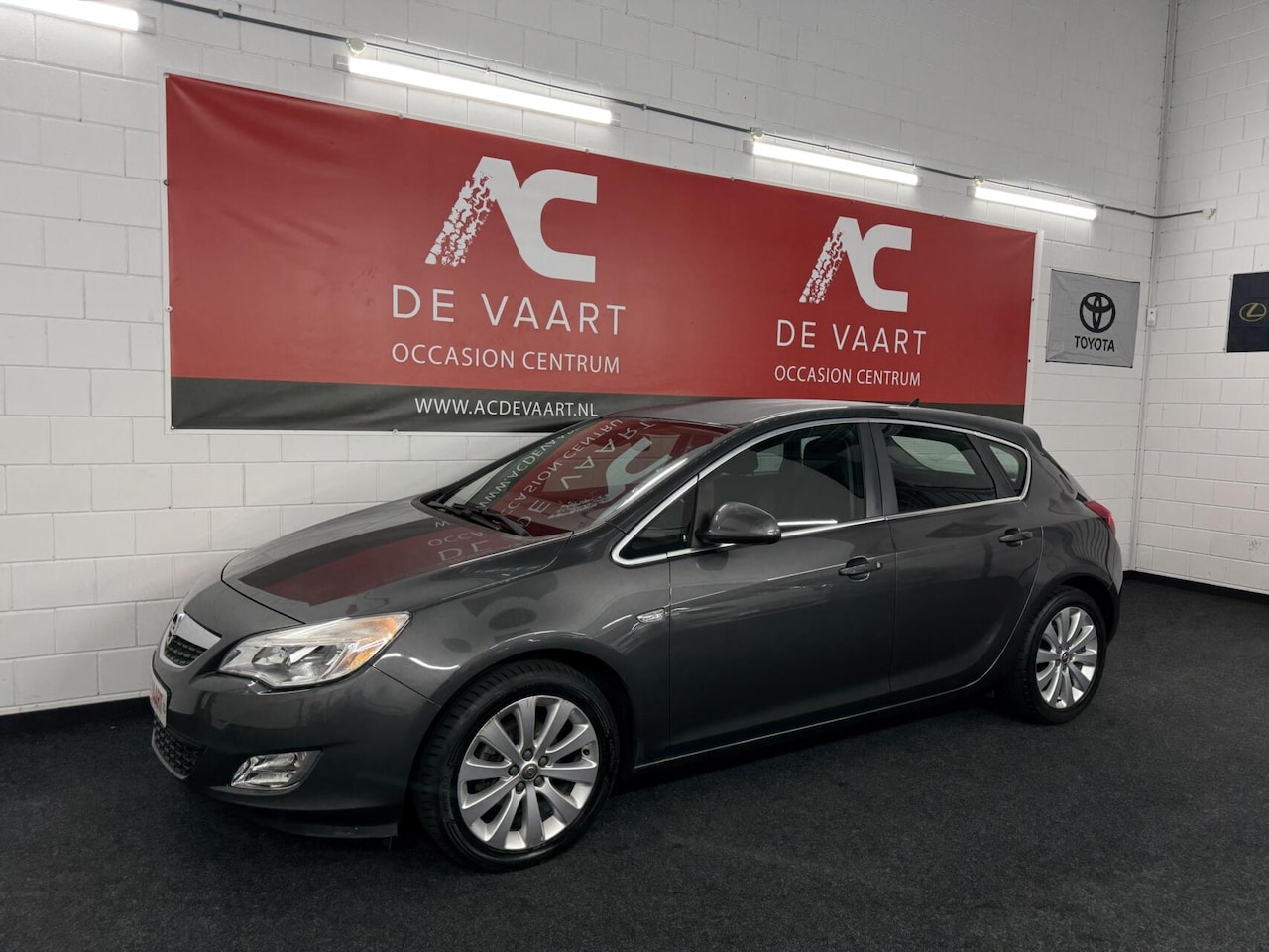 Opel Astra - 1.4 Turbo Cosmo - 6BAK/NAVI/LEER/CRUISE/NAP - AutoWereld.nl