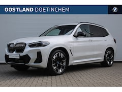 BMW iX3 - High Executive / M Adaptief onderstel / Sportstoelen / Stoelverwarming / Head-Up / Parking