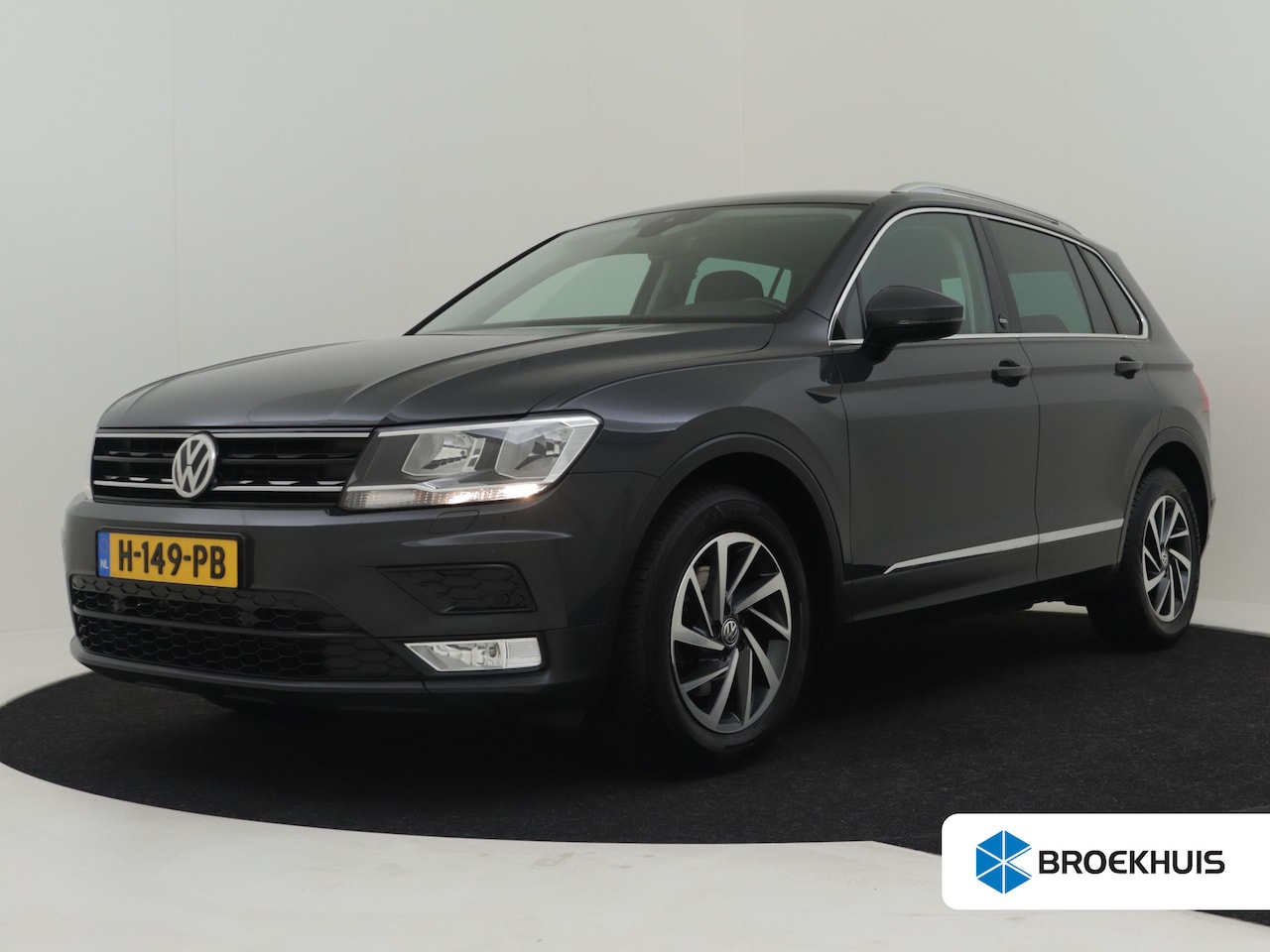 Volkswagen Tiguan - 1.4 TSI Comfortline Voorraad terrein 125pk | Navigatie | Trekhaak | Cruise control | App c - AutoWereld.nl