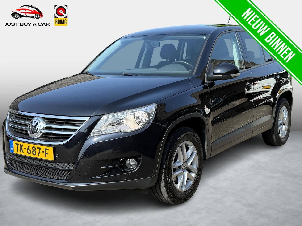 Volkswagen Tiguan - 1.4 TSI Comfort&Design Trekhaak / Navigatie / - AutoWereld.nl