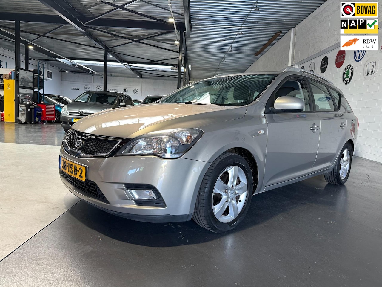 Kia Cee'd Sporty Wagon - 1.4 CVVT Navigator Plus Pack/Apk nieuw bij aflevering - AutoWereld.nl