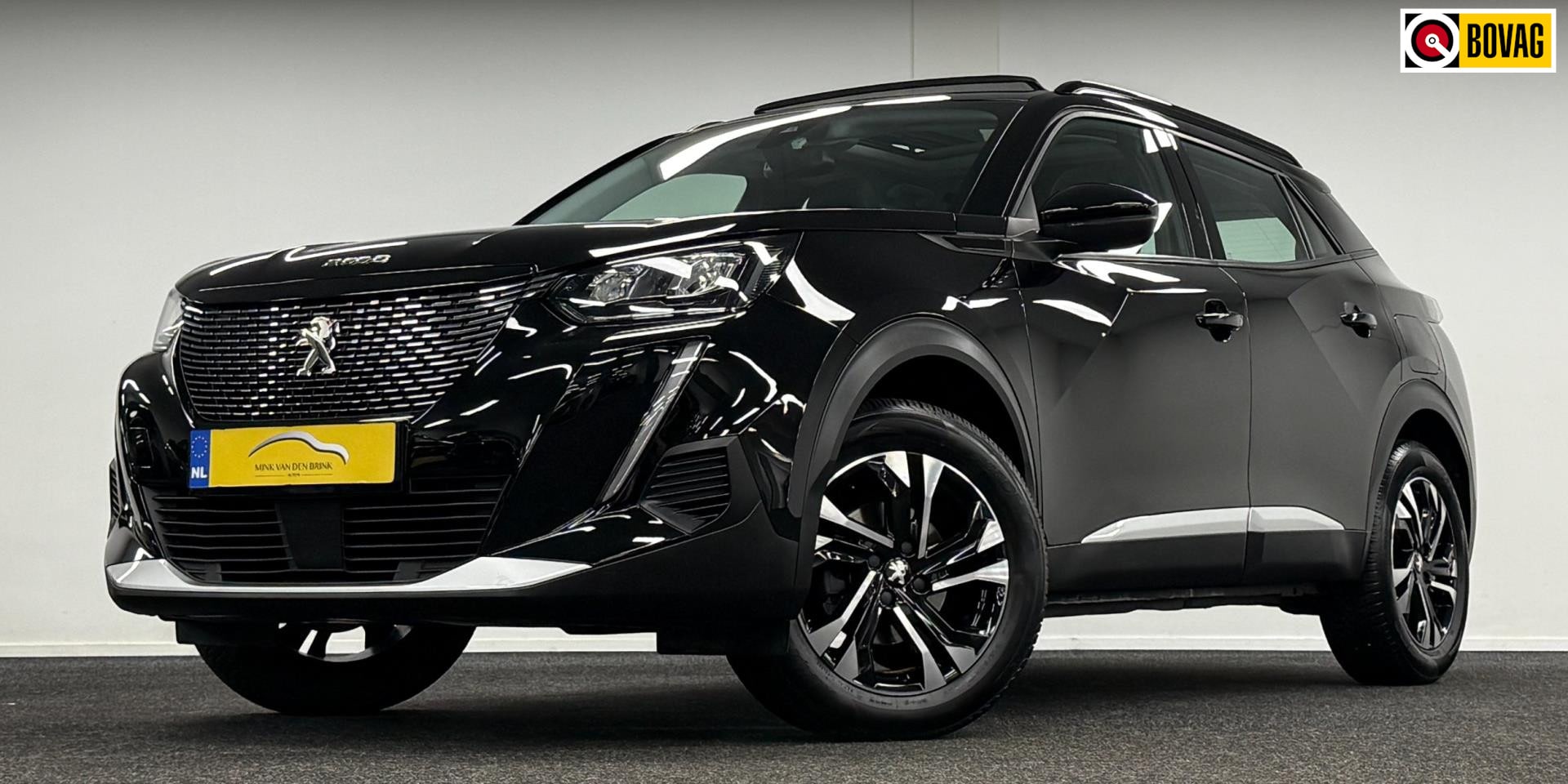 Peugeot 2008 - 1.2 PureTech Allure*Panodak*Navi*Camera*Carplay! - AutoWereld.nl