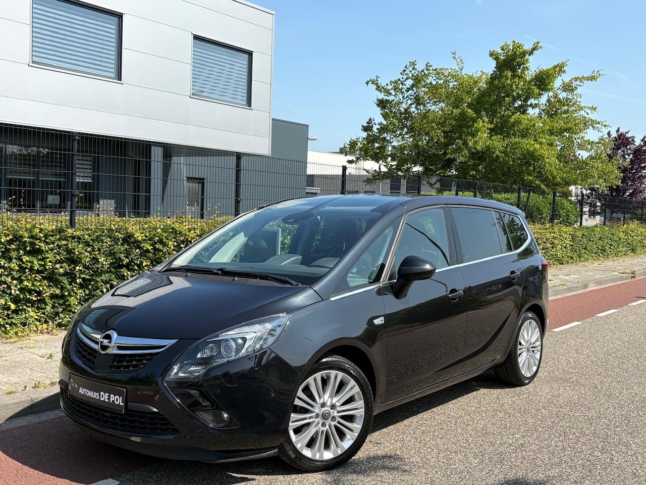 Opel Zafira Tourer - 1.4 Cosmo 7p. Cruise/climate control navi fietsendrager achteruitrijcamera panoramadak - AutoWereld.nl
