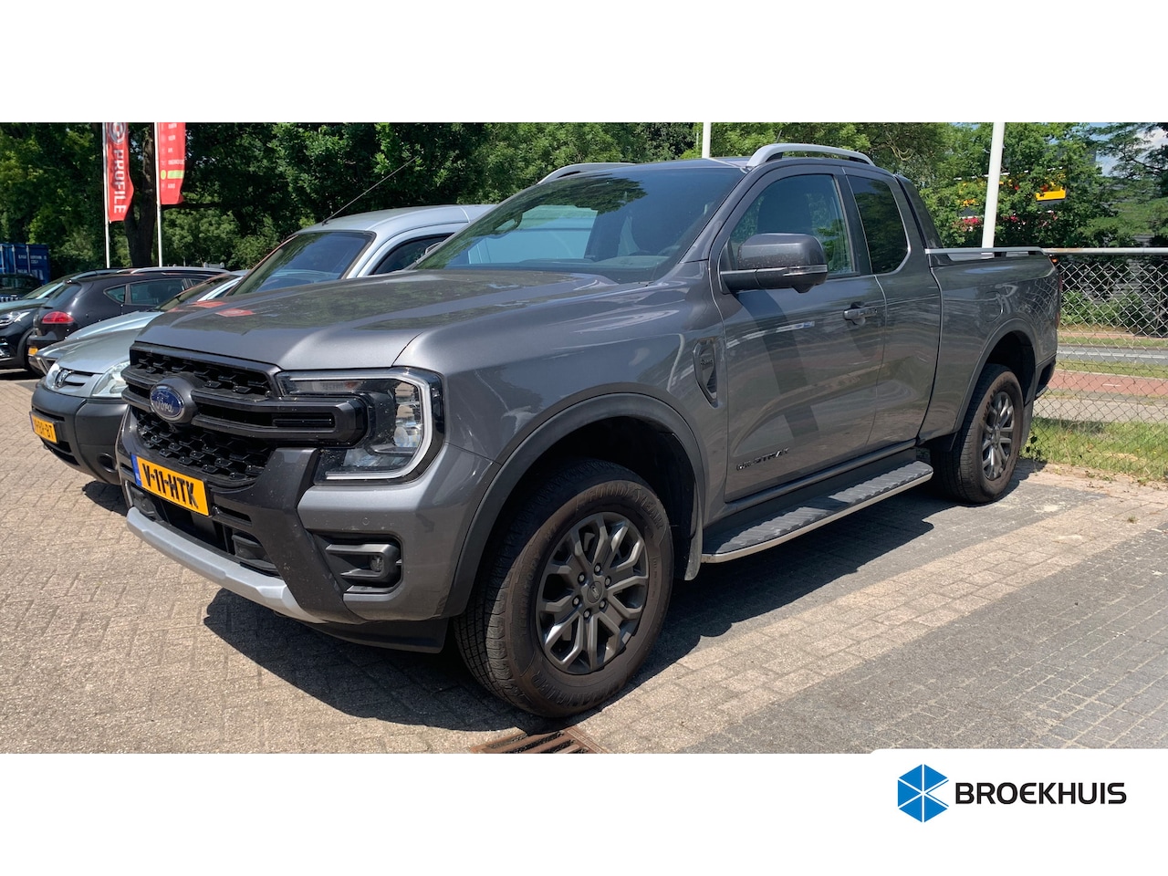 Ford Ranger - 2.0 Wildtrak Super Cab EcoBlue | Elektrische Rollertop | - AutoWereld.nl