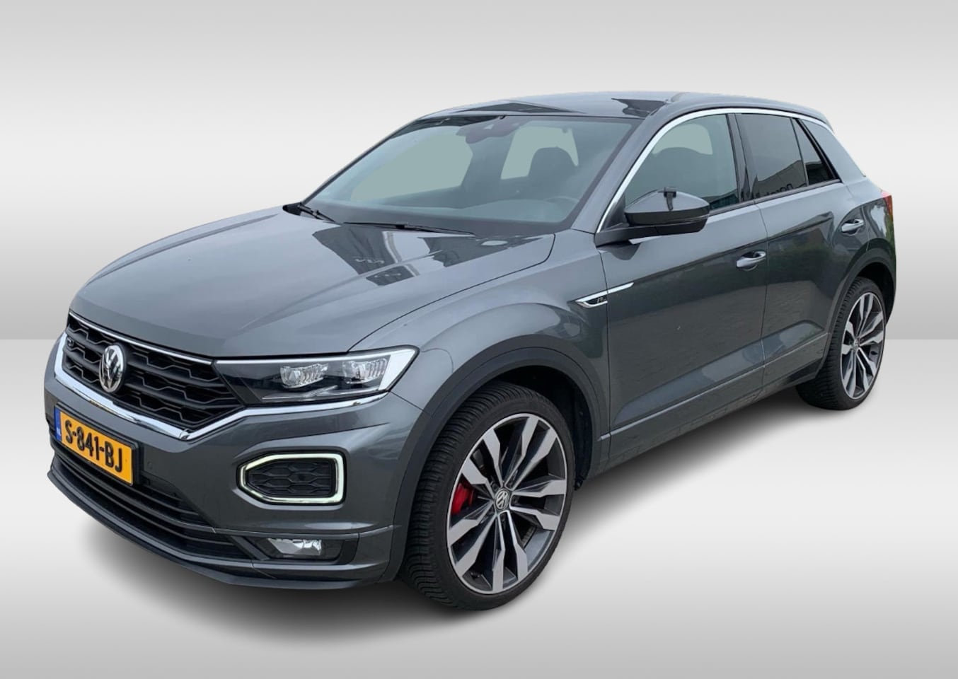 Volkswagen T-Roc - 1.5 TSI Sport Business 3x R-Line / Camera / Virtual Cockpit / Navigatie / 19'' / Keyless / - AutoWereld.nl