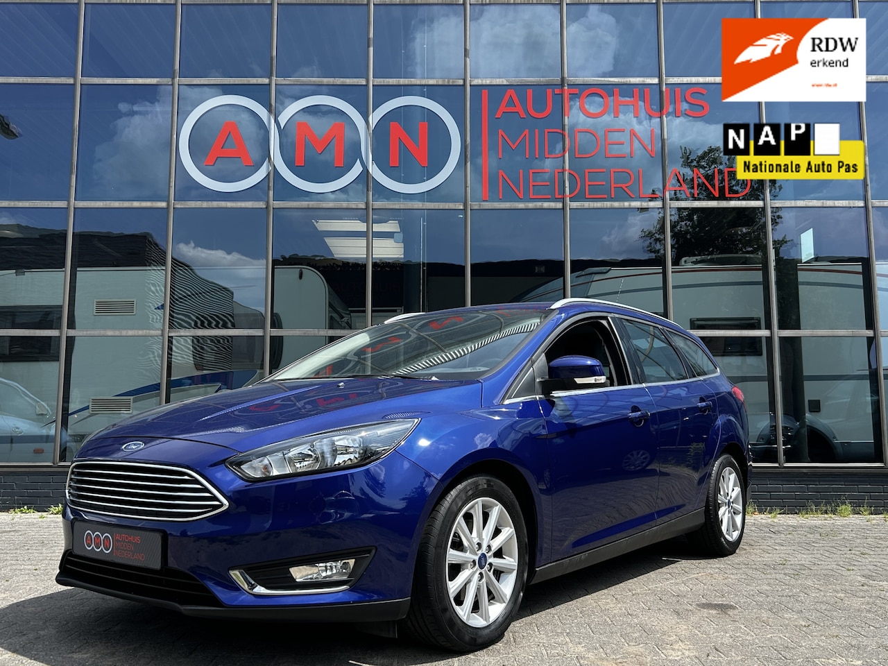 Ford Focus Wagon - 1.0 Titanium Cruisectr,Navi,Stoelverwarming,LMV16” - AutoWereld.nl