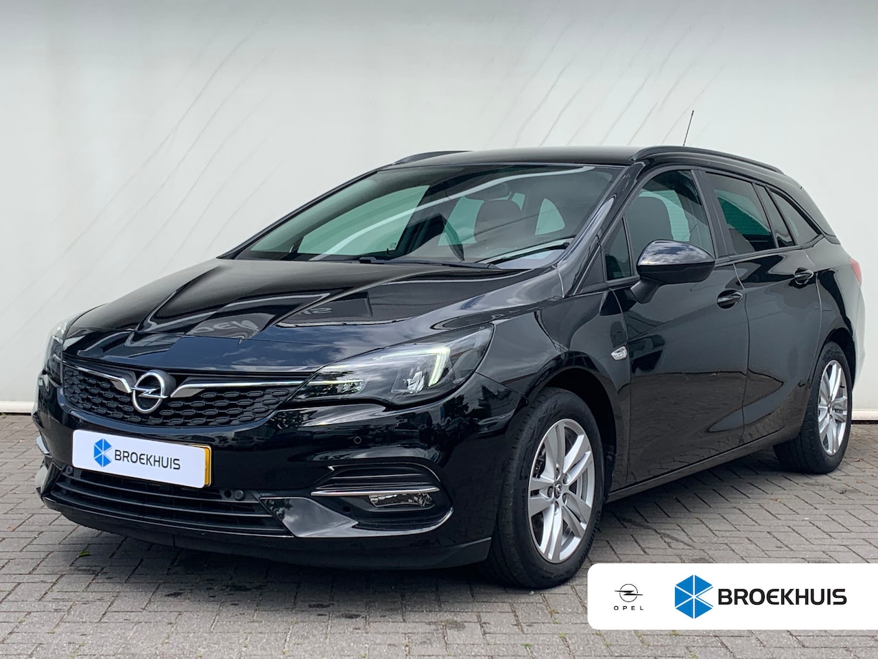 Opel Astra Sports Tourer - 1.2 Edition 110pk | 16" Lichtmetalen velgen, 10-spaaks | Achteruitrijcamera | Achteruitrij - AutoWereld.nl