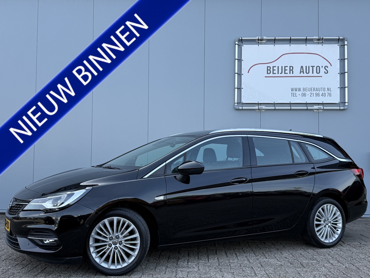 Opel Astra Sports Tourer - 1.2 Ultimate Carplay/Trekhaak/Camera. - AutoWereld.nl