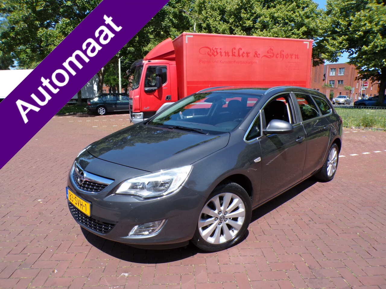 Opel Astra Sports Tourer - 1.4 Turbo Cosmo AUTOMAAT ORG KM MET NAP...... - AutoWereld.nl