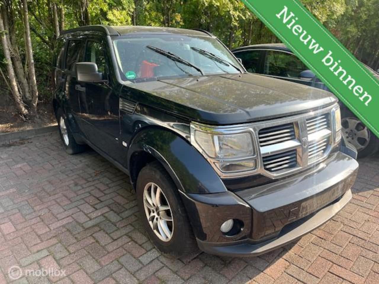 Dodge Nitro - 2.8 CRD SXT AUTO LOOPT NIET GEEN IDEE WAT ER MEE IS - AutoWereld.nl