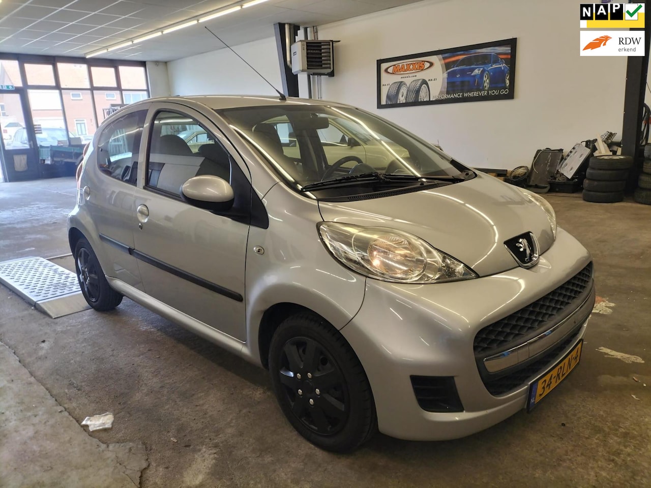 Peugeot 107 - 1.0-12V Sportium 1.0-12V Sportium - AutoWereld.nl