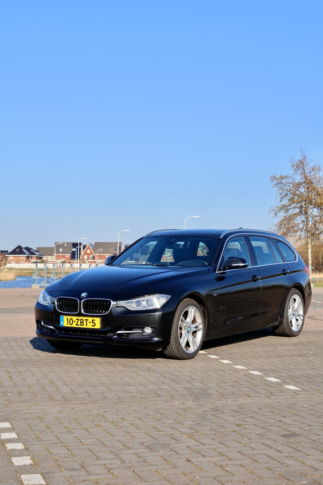 BMW 3-serie Touring - 328i High Executive - AutoWereld.nl