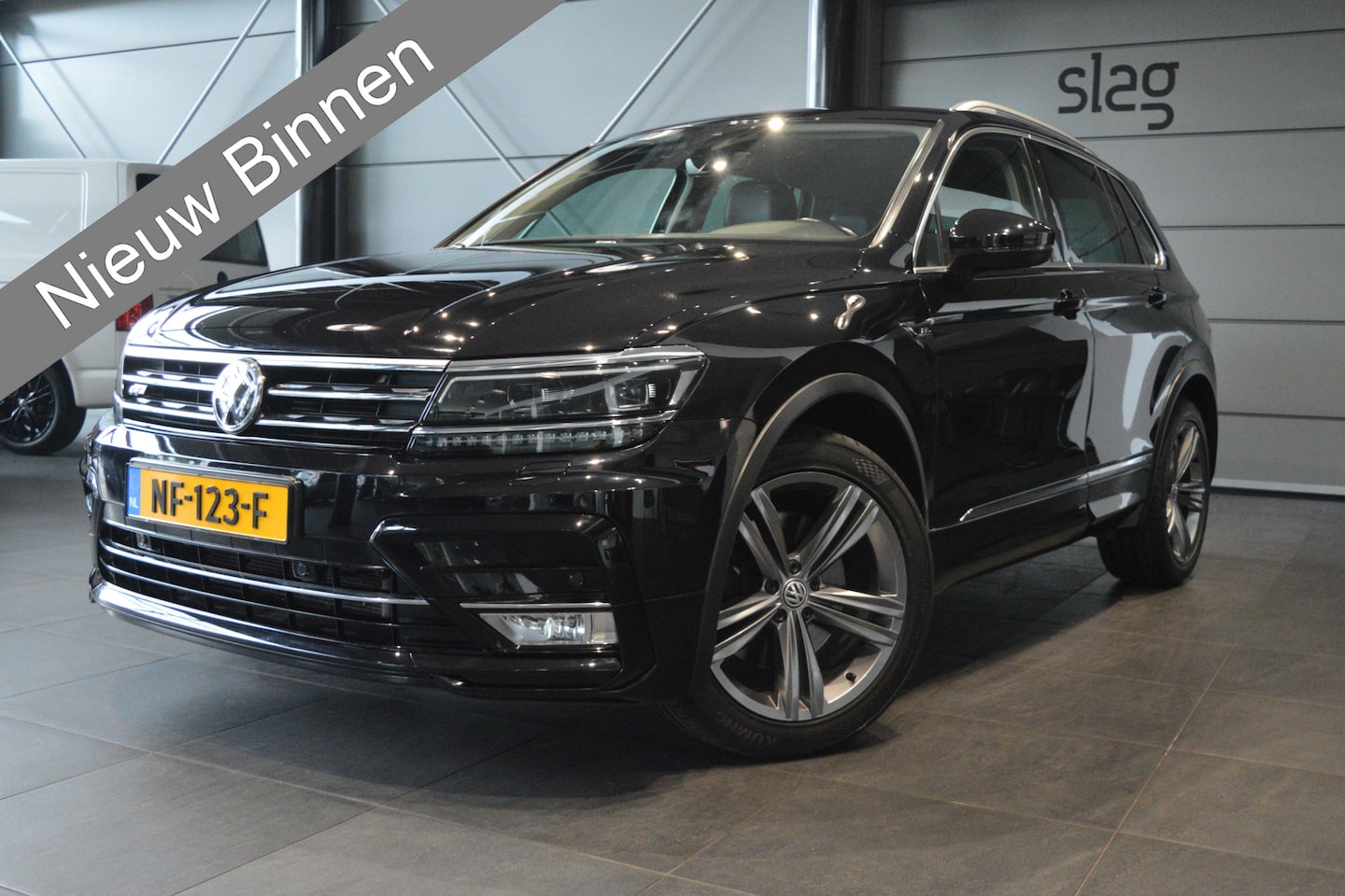 Volkswagen Tiguan - 2.0 TSI 4Motion R-LINE navi leer cruise led 19 inch 180 pk !! - AutoWereld.nl