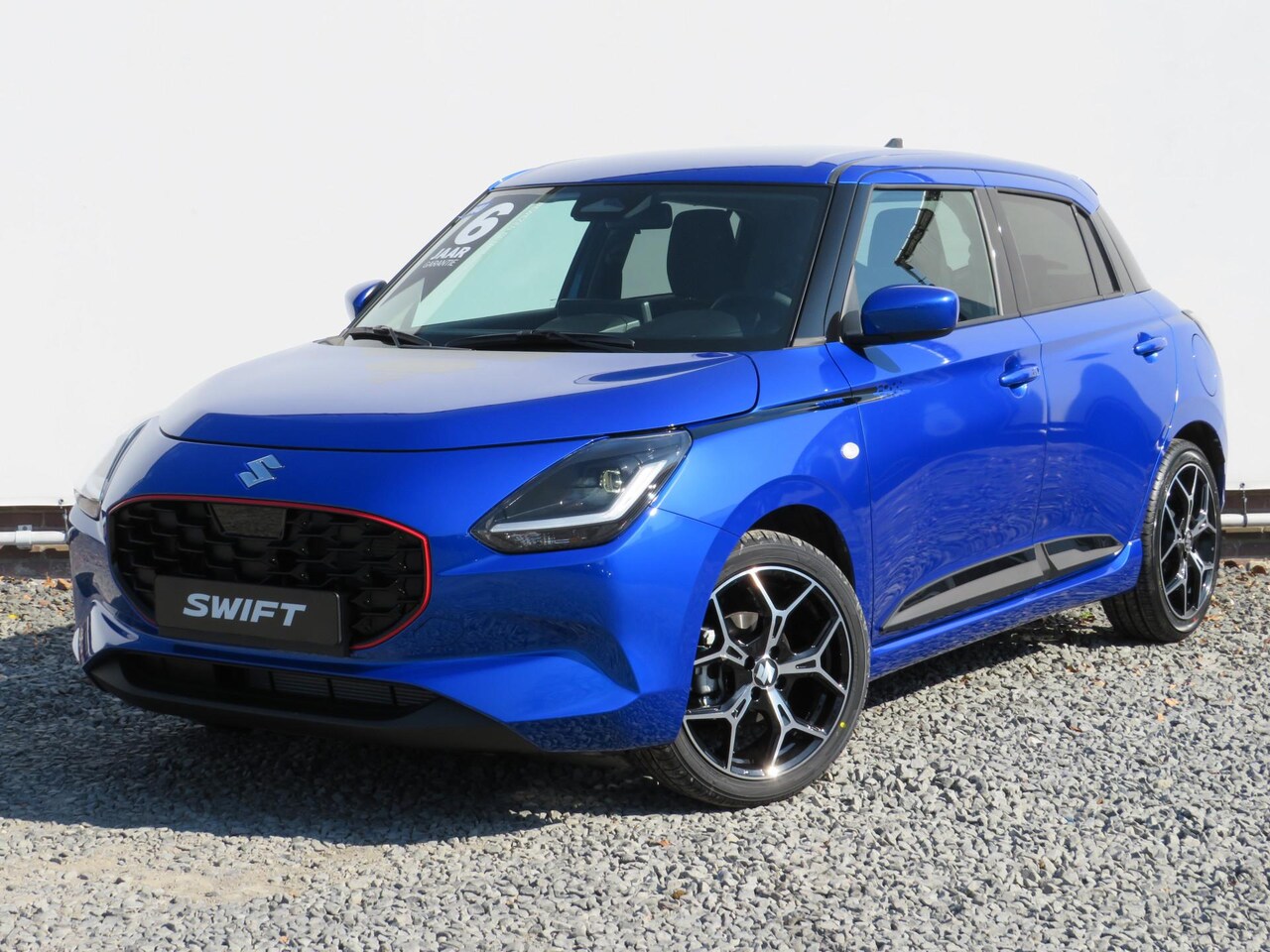 Suzuki Swift - 1.2 Select Smart Hybrid 1.2 Select Smart Hybrid, SPECIALE JUBILEUM 17 inch LM-Velgen, Stripingpakket en Shark Fin - AutoWereld.nl