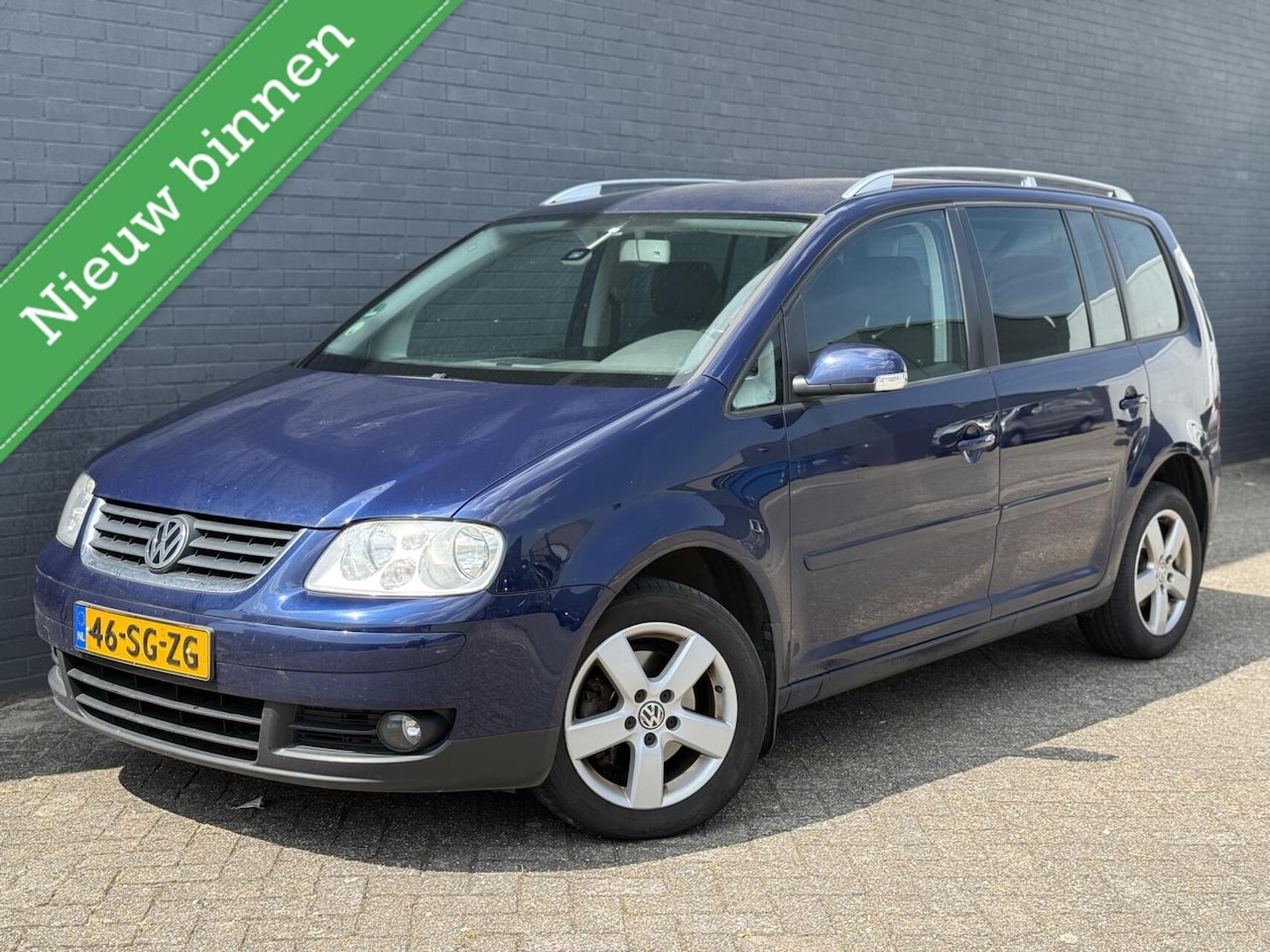 Volkswagen Touran - 2.0-16V FSI Highline 2.0-16V FSI Highline - AutoWereld.nl