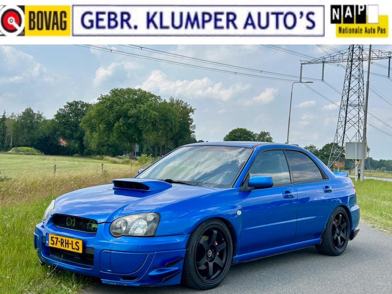 Subaru Impreza - 2.0 WRX AWD Rally Blue, NL-Auto, Weinig km, Invidia - AutoWereld.nl