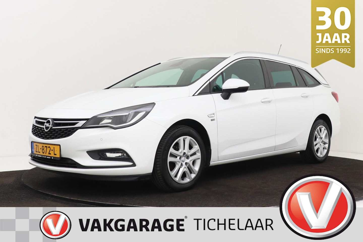 Opel Astra Sports Tourer - 1.0 Turbo 120 Jaar Edition | Comfortstoelen | Dealer Ond. | Org NL | CarPlay | Climate Con - AutoWereld.nl