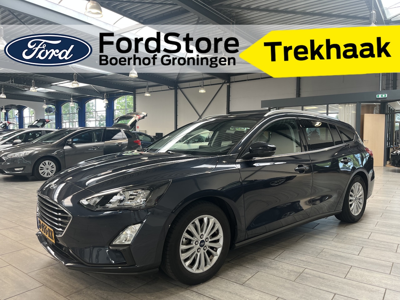 Ford Focus Wagon - EcoBoost 125pk Titanium | Trekhaak | Keyless | 100% dealer onderhouden | Cruise | Clima | - AutoWereld.nl