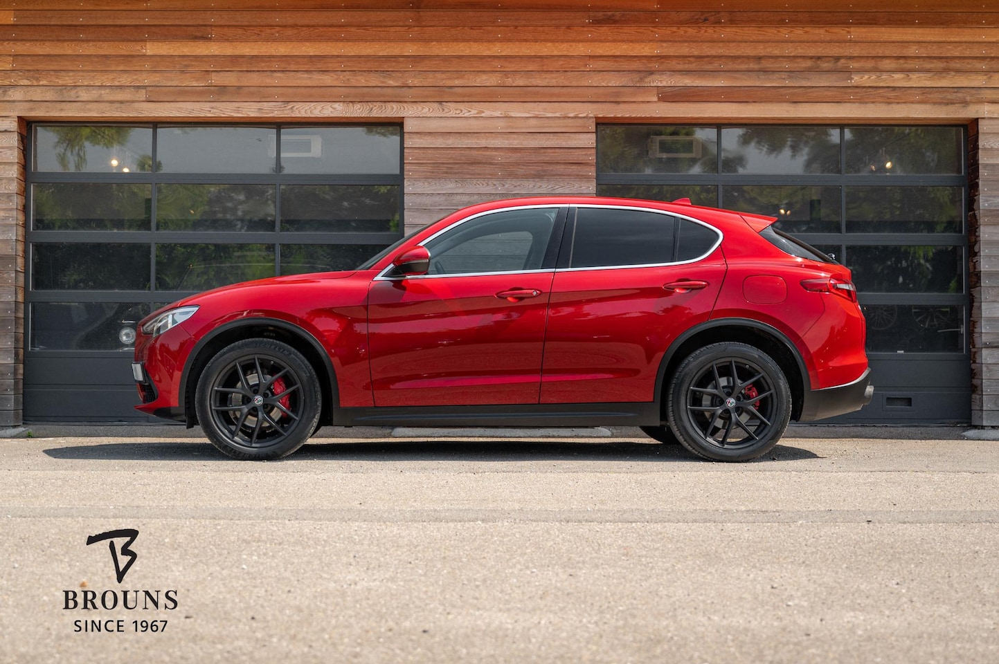Alfa Romeo Stelvio - 2.0 T AWD 280pk | Rosso Competizione | Camera - AutoWereld.nl