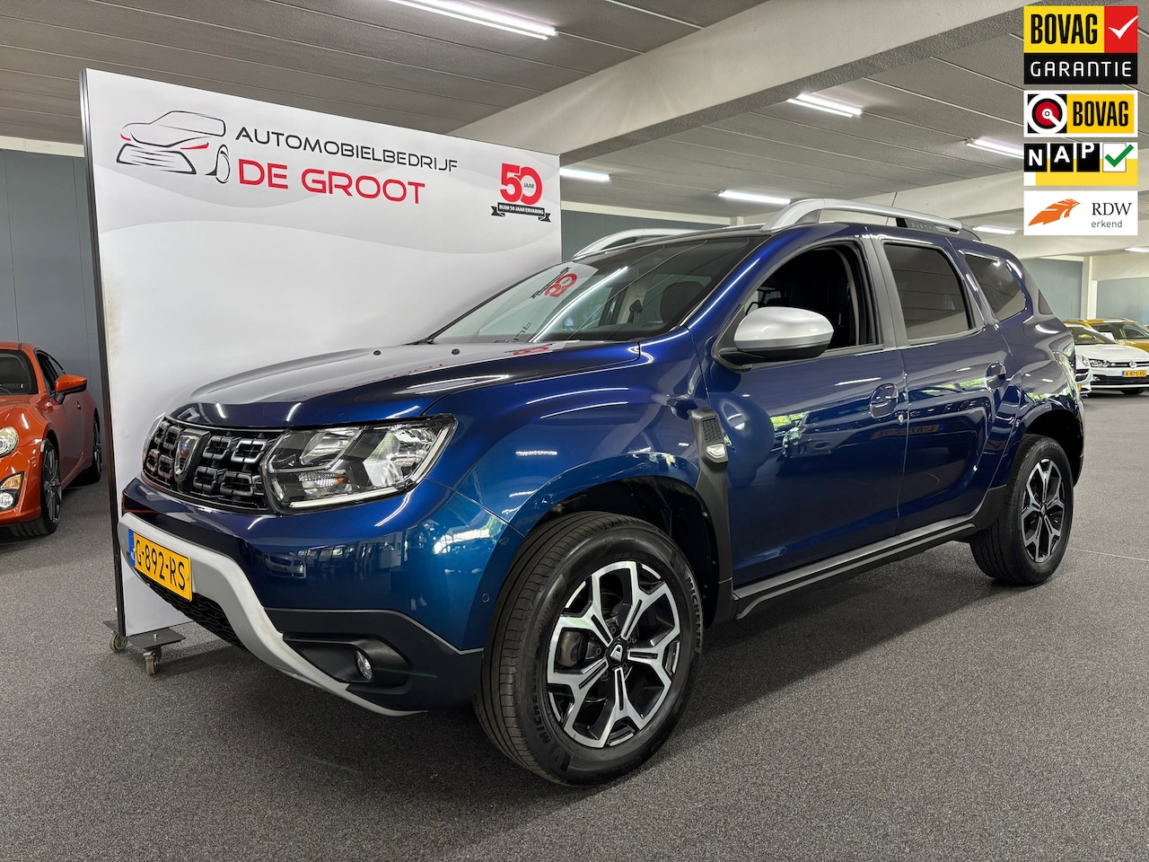 Dacia Duster - 1.3 TCe Prestige / NL-auto, Cruise control, Navi, Airco, Camera - AutoWereld.nl