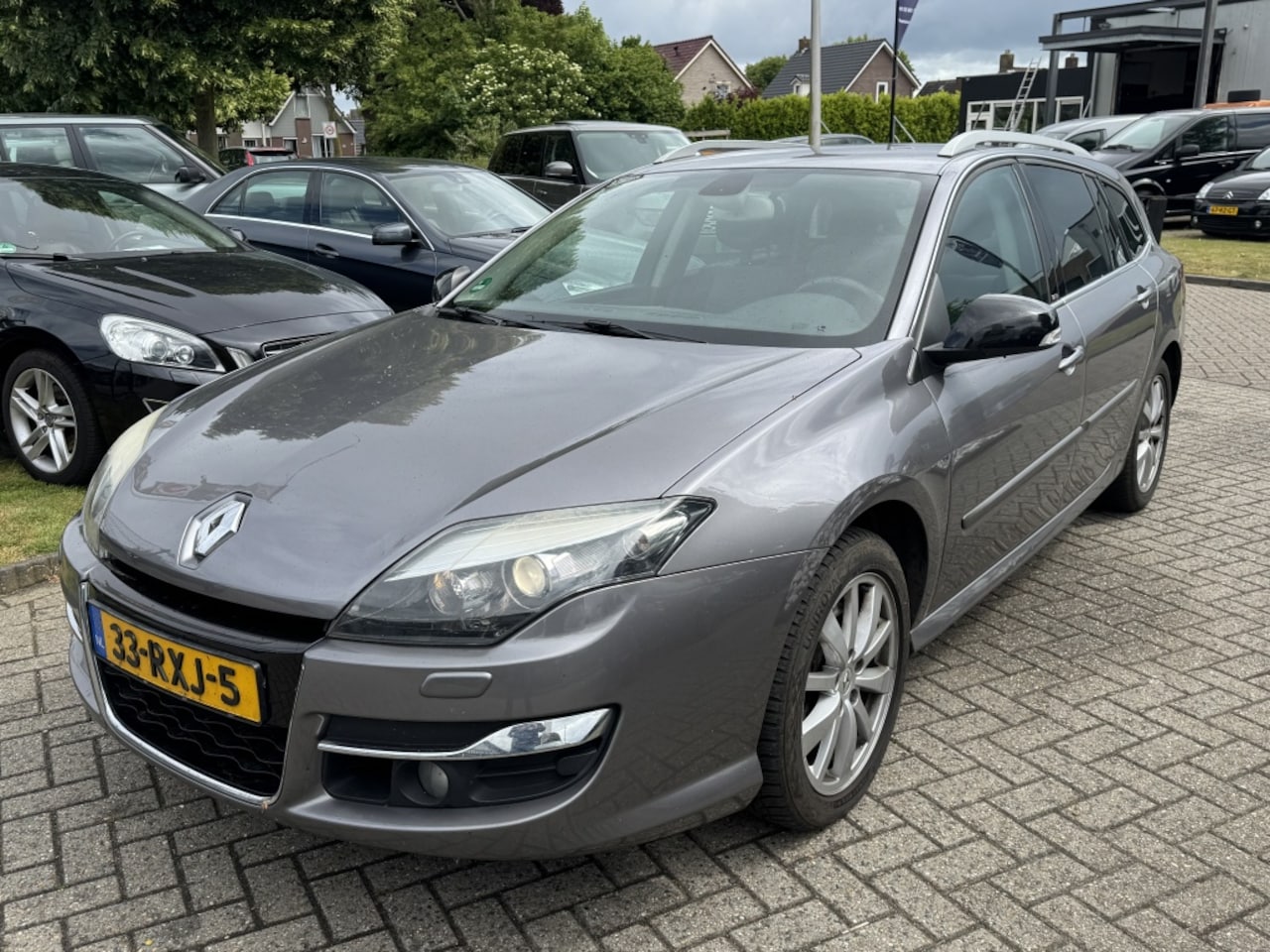 Renault Laguna Estate - 2.0 DCI Parsienne Xenon 2011 Grijs EX BPM - AutoWereld.nl