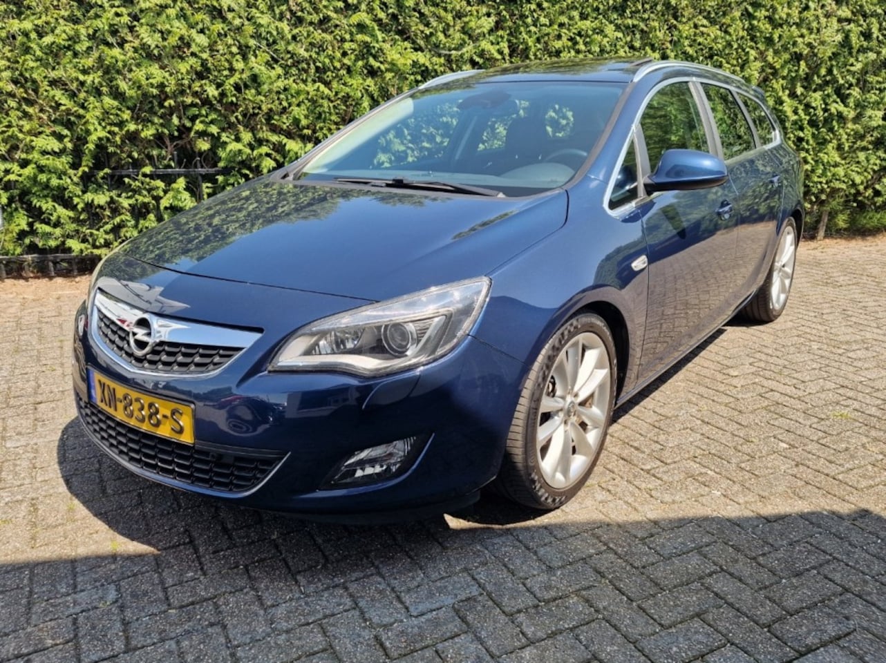 Opel Astra - 1.4 Turbo sport: Xenon trekhaak schuifdak - AutoWereld.nl