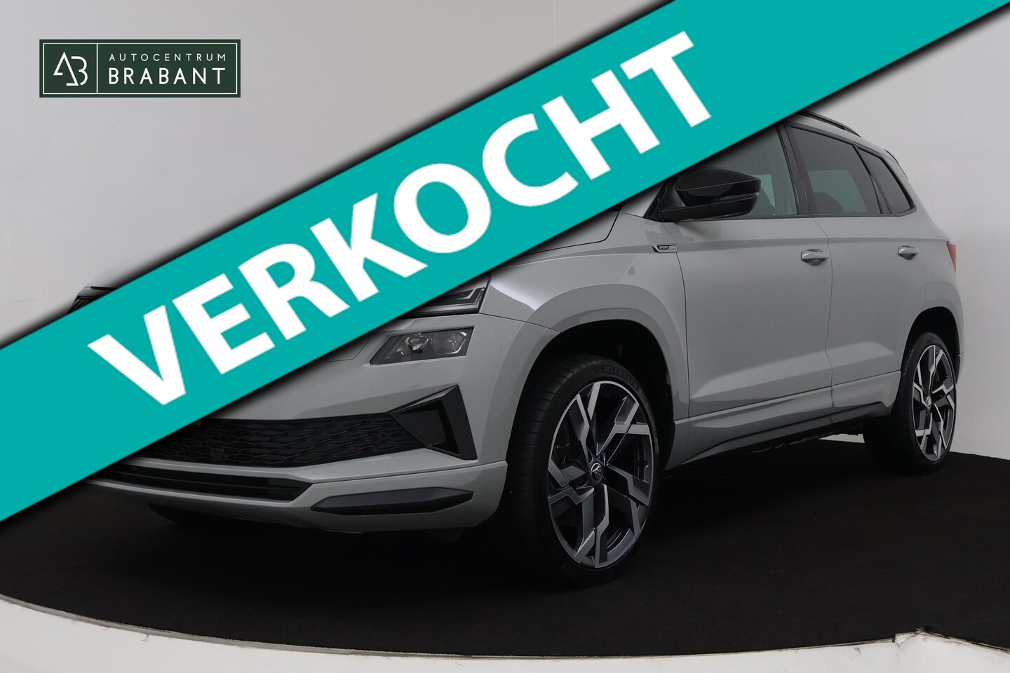 Skoda Karoq - 1.5 TSI ACT Sportline Business (PANORAMADAK, STOEL-/STUURVERWARMING, ELEKT. TREKHAAK, ADAP - AutoWereld.nl