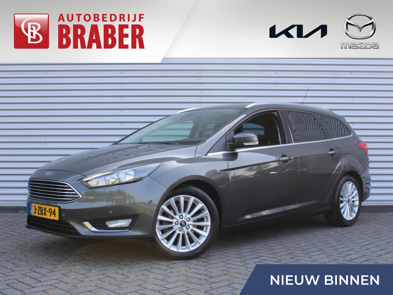 Ford Focus Wagon - 1.0 First Edition | Trekhaak | Voorruitverwarming | Navi | 17" LM | Clima | Parkeersensore - AutoWereld.nl