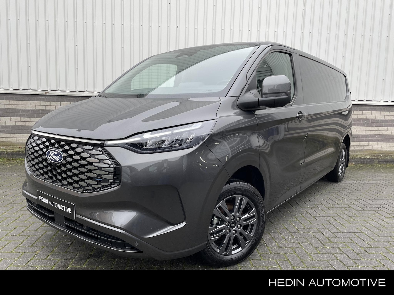 Ford Transit Custom - E-Transit 320 L2H1 Limited 65 kWh - AutoWereld.nl