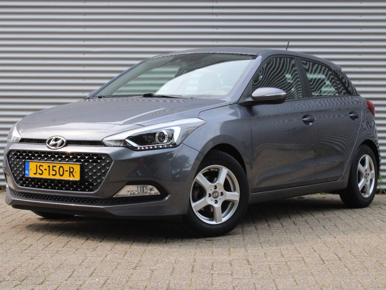 Hyundai i20 - 1.2 HP i-Motion Comfort | Achteruitrijcamera | Airco (automatisch) | Navigatie - AutoWereld.nl
