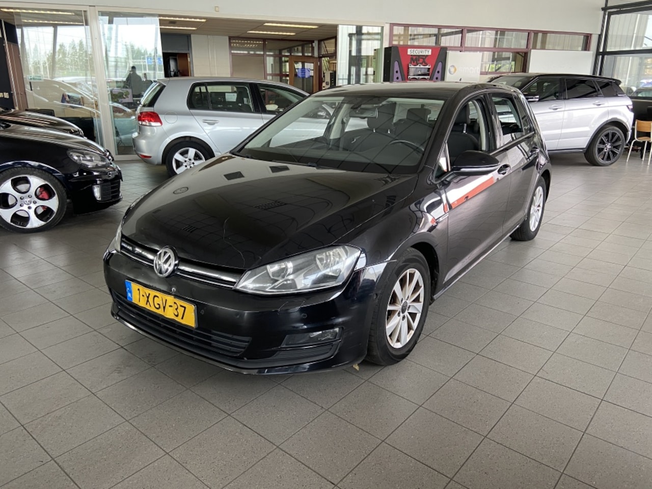 Volkswagen Golf - 1.6 TDI Highl. BlM. - AutoWereld.nl