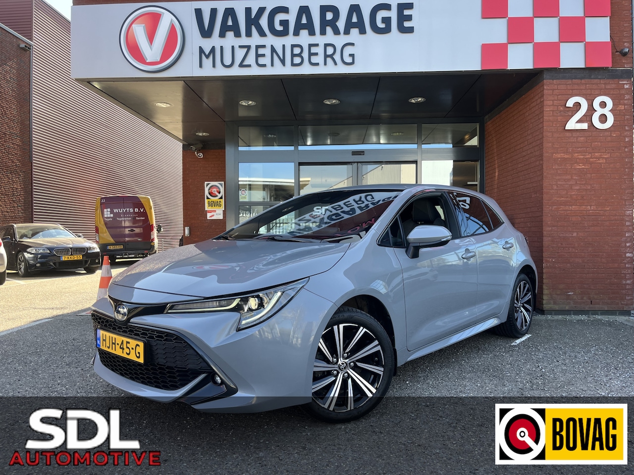 Toyota Corolla - 1.8 Hybrid Dynamic // FULL LED // HALF LEDER // ADAPT. CRUISE // KEYLESS // CAMERA // STOE - AutoWereld.nl