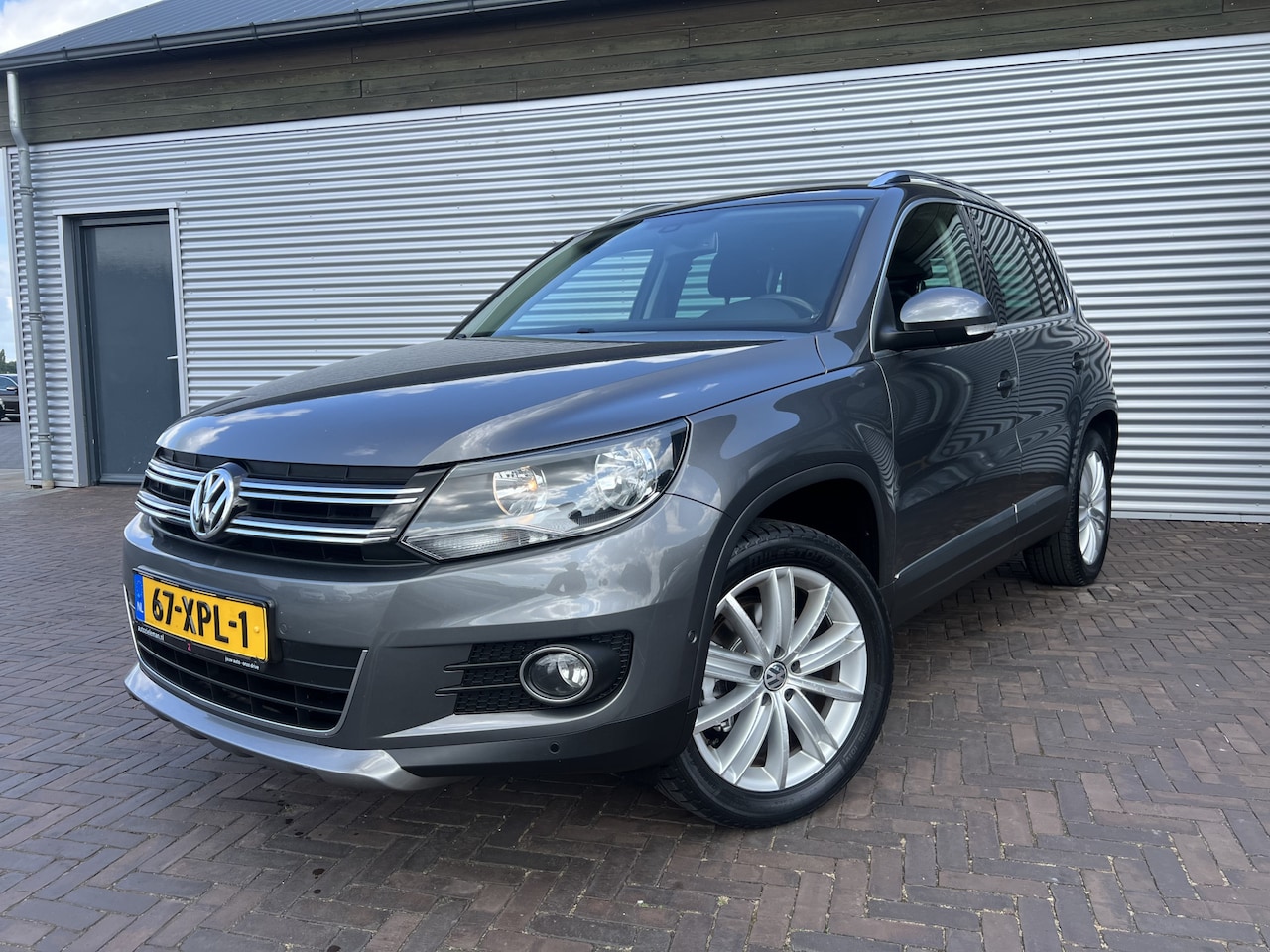 Volkswagen Tiguan - 1.4 TSI Sport&Style - AutoWereld.nl
