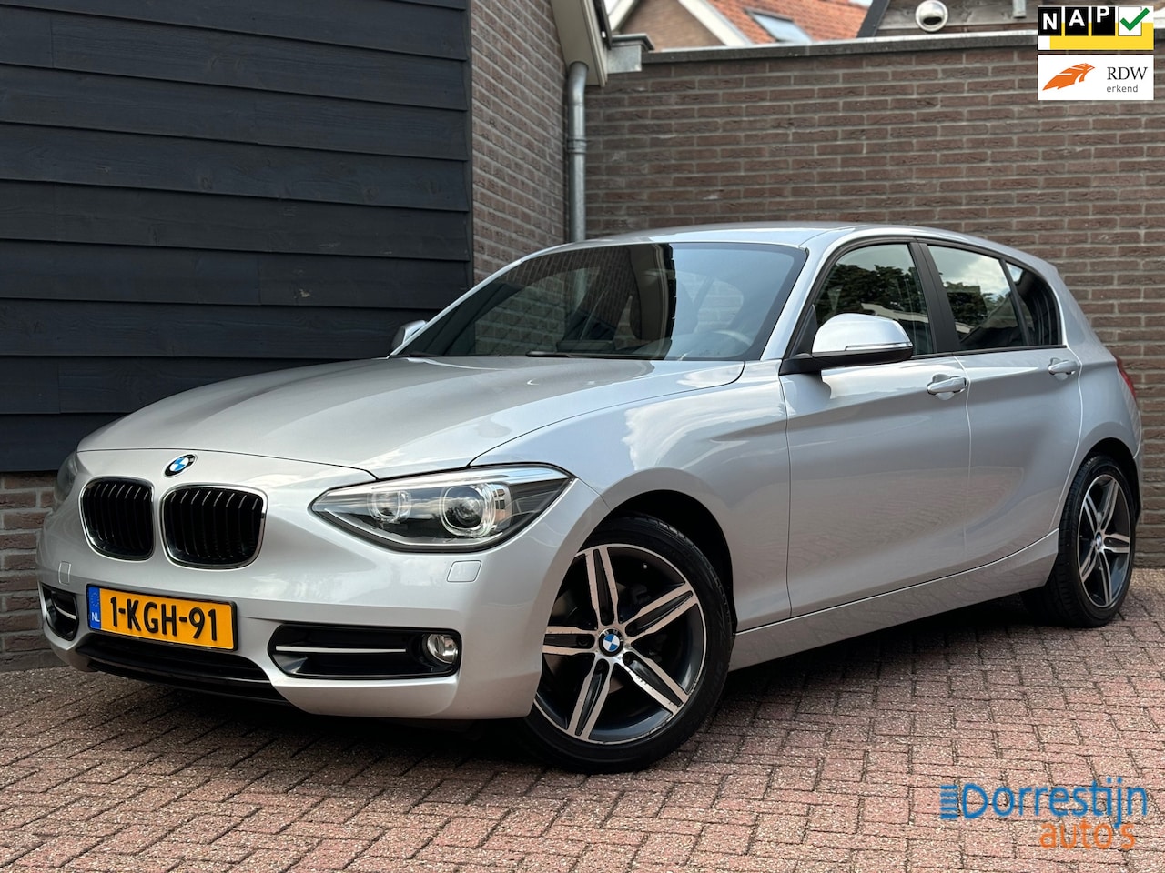 BMW 1-serie - 114i Upgrade Edition M-pakket | Groot navi | PDC | Cruise | Leder | Led - AutoWereld.nl