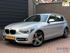 BMW 1-serie - 114i Upgrade Edition M-pakket | Groot navi | PDC | Cruise | Leder | Led