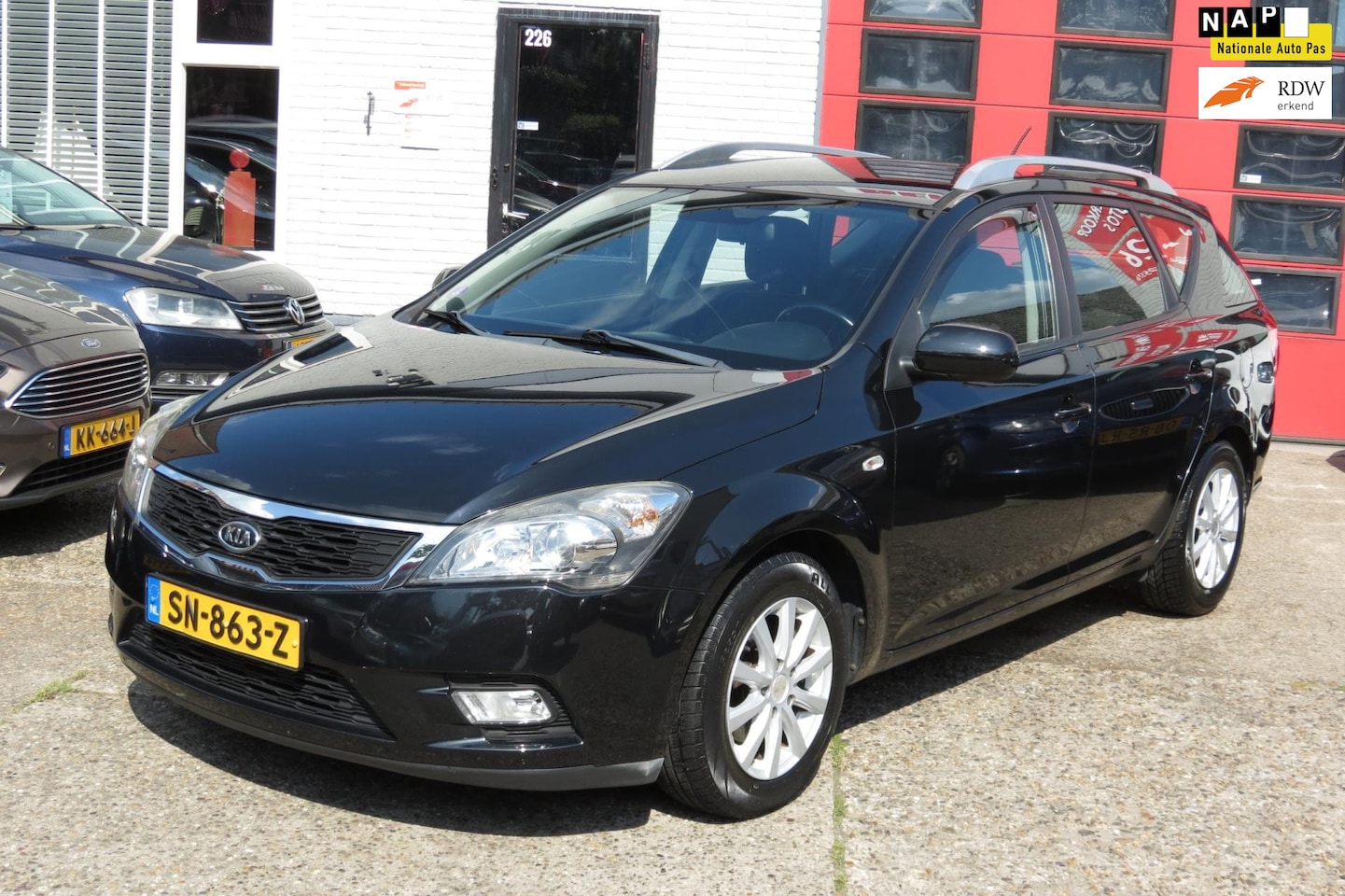 Kia Cee'd Sporty Wagon - 1.4 CVVT X-ecutive 1.4 CVVT X-ecutive , AIRCO, NAVIGATIE, LM VELG - AutoWereld.nl