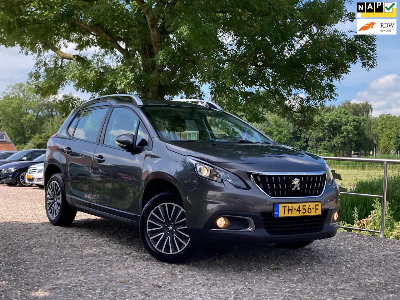 Peugeot 2008 - 1.2 PureTech Blue Lion | Cruise + Airco + Navi Nu € 8.450,-!!! - AutoWereld.nl