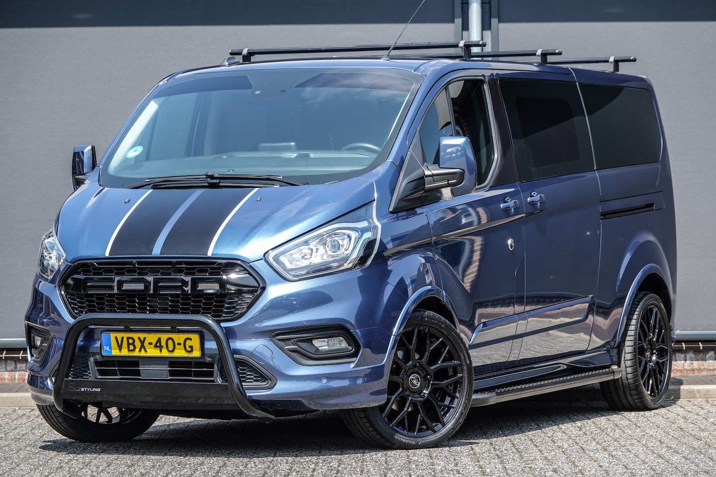 Ford Transit Custom - L2H1 2.0Tdci 185Pk Aut. | Sport | Dubbel Cabine | 2xSchuifdeur | Raptor Grille | Bull Bar - AutoWereld.nl