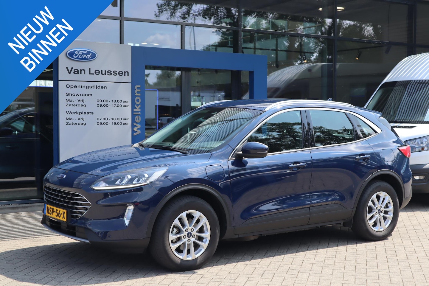 Ford Kuga - 2.5 PHEV TITANIUM APPLE/ANDROID PARK-SENSOREN CAMERA KEYLESS NAVI WINTERPACK - AutoWereld.nl