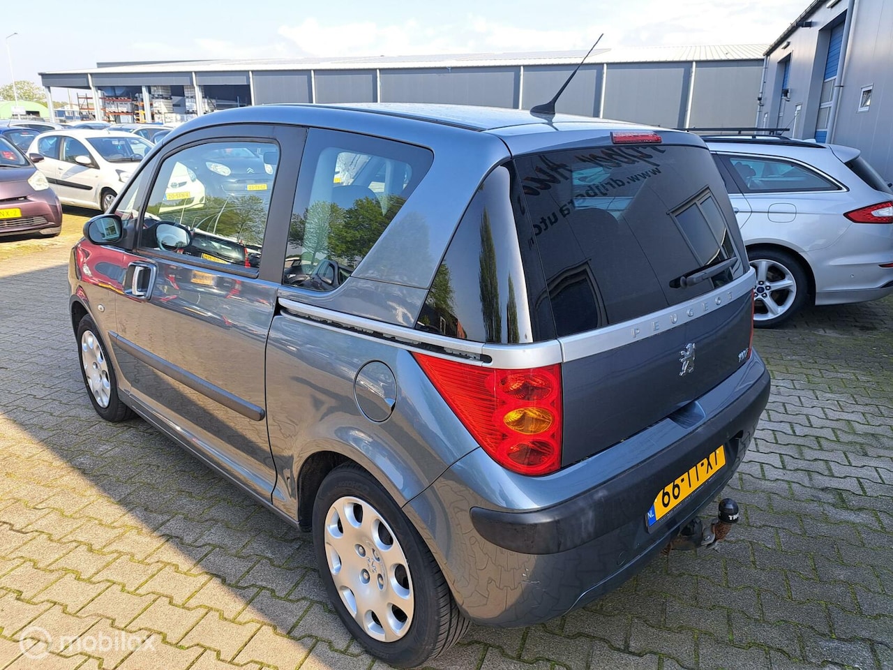 Peugeot 1007 - 1.4 Sesam Gentry 1.4 Sesam Gentry - AutoWereld.nl