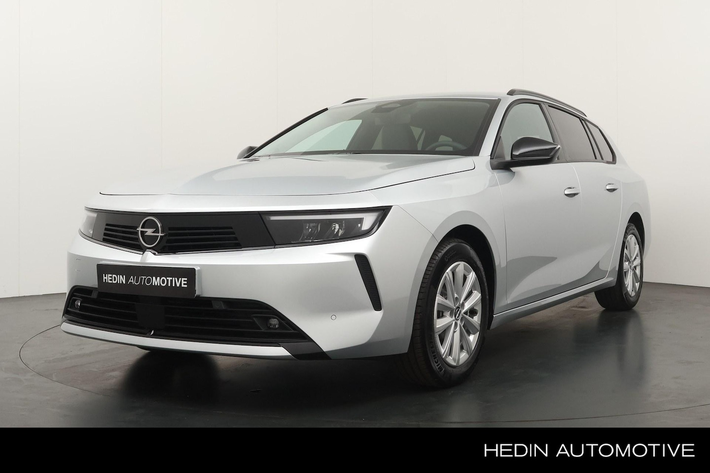Opel Astra Sports Tourer - 1.2 Turbo Business Edition Climate Control | Full Map Navigatie | Stuur- en Stoelverwarmin - AutoWereld.nl