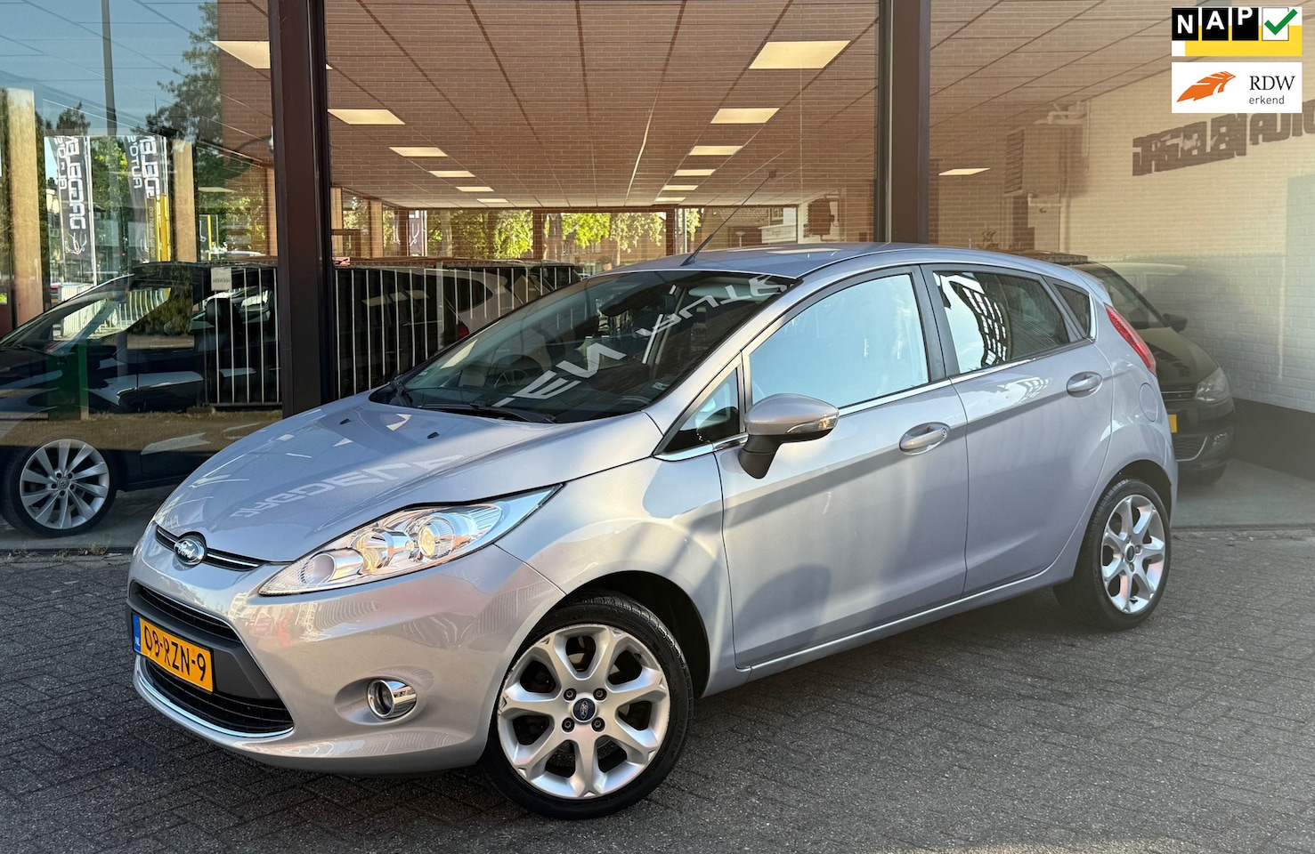 Ford Fiesta - 1.4 Titanium AIRCO CLIMATE | CRUISE | PDC | NAP - AutoWereld.nl