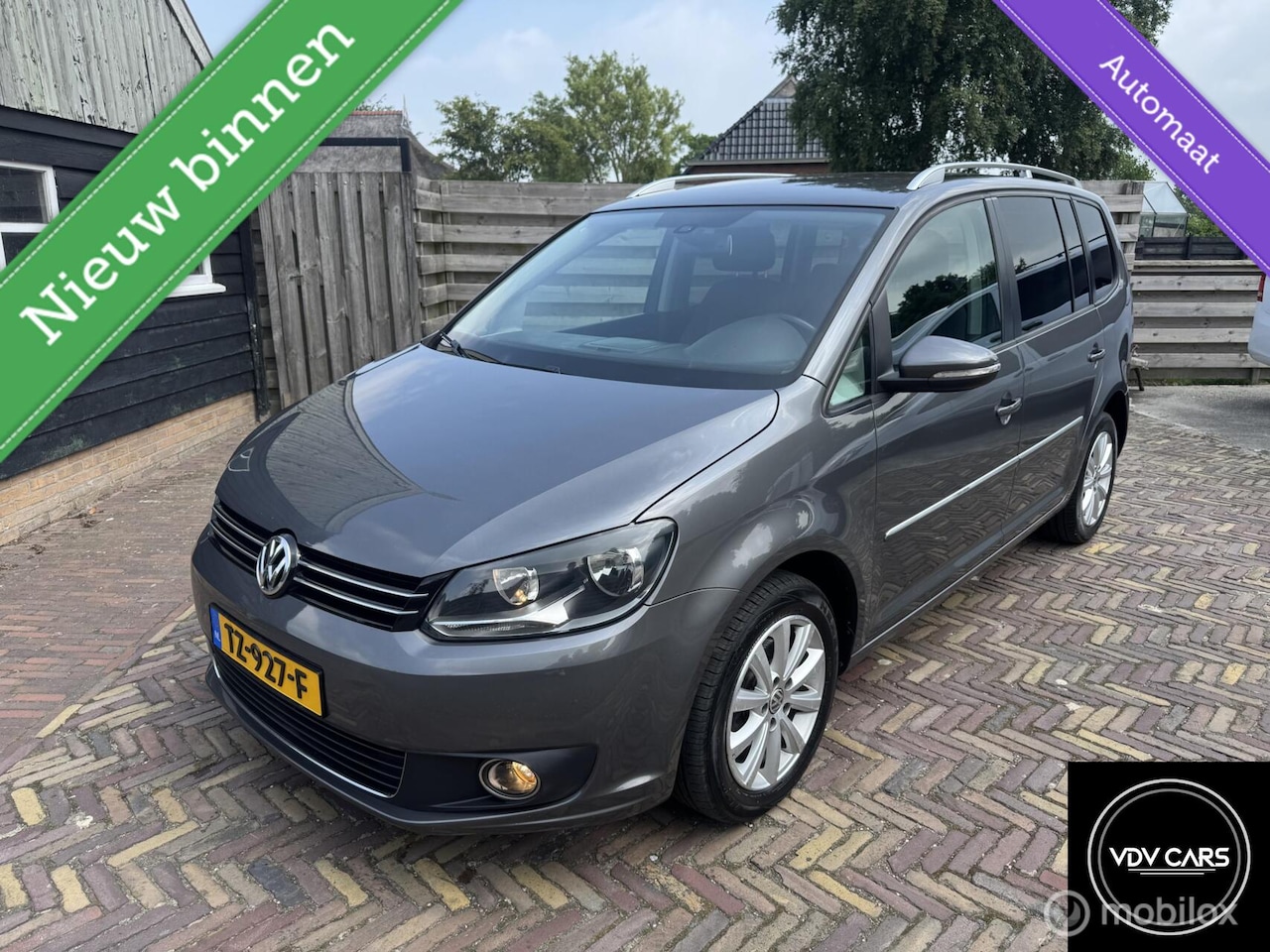 Volkswagen Touran - 1.6 TDI AUT. Highline 7-persoons - AutoWereld.nl