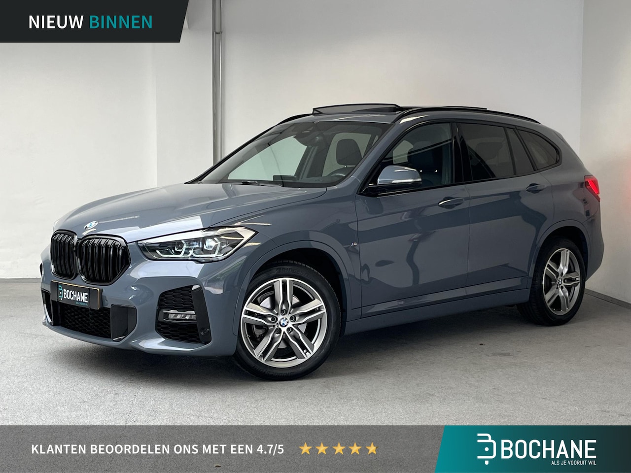 BMW X1 - sDrive18i M Sport | 1e-EIG. | PANO | HEAD-UP | ORG.NL | STORM BAY GREY | - AutoWereld.nl