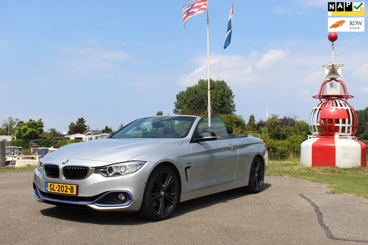 BMW 4-serie Cabrio - 428i High Executive *NL AUTO *MPACK *HEADUPP *CAMERA *LEER - AutoWereld.nl