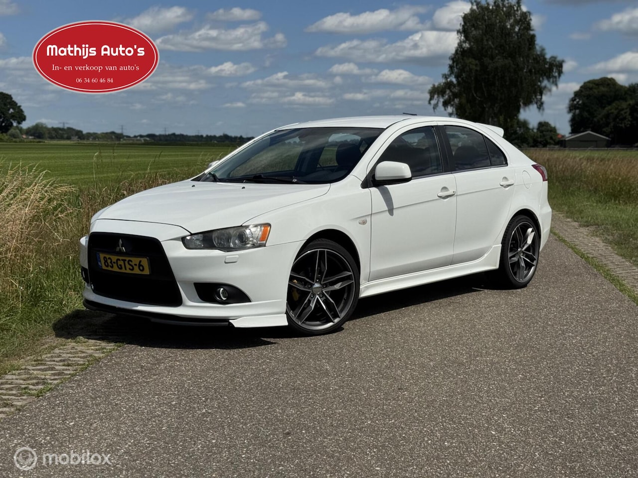 Mitsubishi Lancer Sportback - 1.8 Instyle LPG G3 Leder Airco Navi - AutoWereld.nl