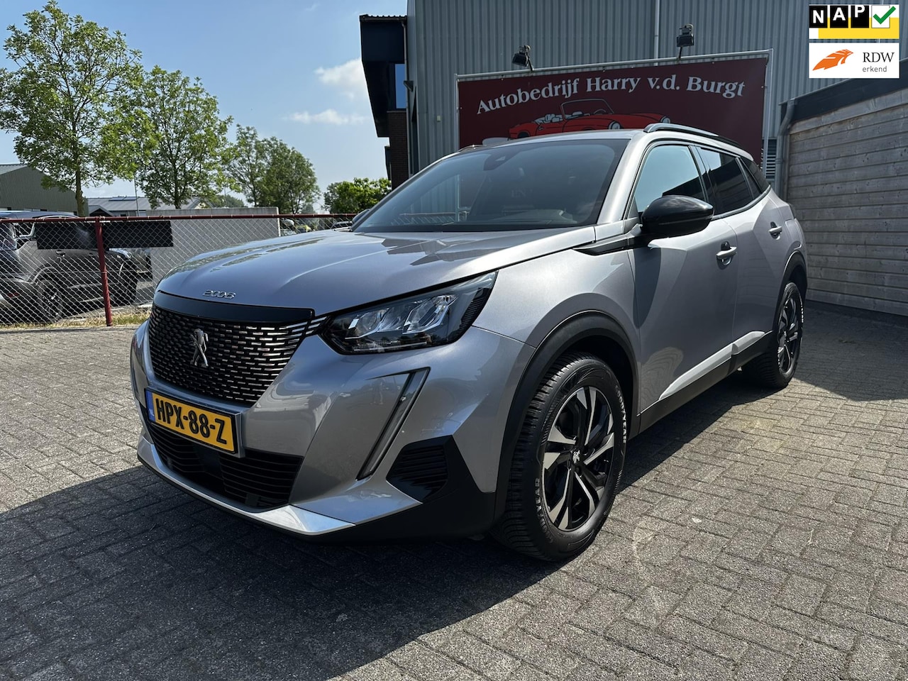 Peugeot 2008 - 1.2 PureTech Allure Pack Navigatie | Camera | Climate Control - AutoWereld.nl