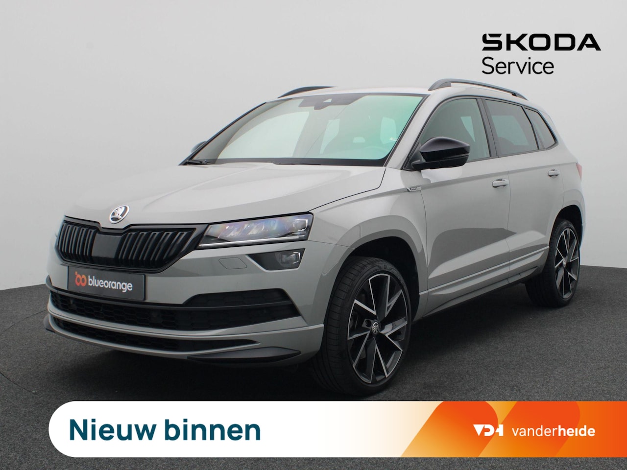 Skoda Karoq - 1.5 TSI ACT Sportline Business 150PK DSG Adaptieve Cruise Controle, Achteruitrijcamera, Ke - AutoWereld.nl